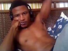 Erotic black gay dude jerking off his huge hard black dick