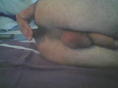 Hairy young bitch with plug in ass