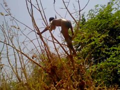 Village Boy Nude In Forest And Play With Tree