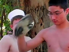 Navy twinks Justin Lake and Frankie Chan fuck outdoors