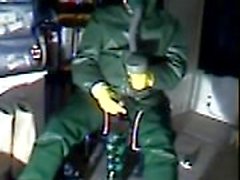 An old vid wanking in green rubber.