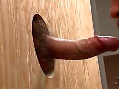 Swallowing a cock through the gloryhole