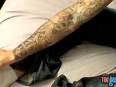 Inked stud Evan Heinze caresses feet and cock solo
