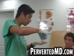 Stud patient masturbates as doctor fingers his ass