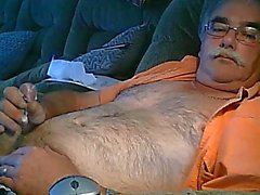 Hairy daddy wanking on cauch