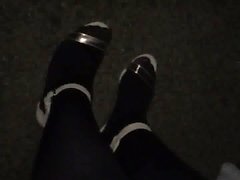 Shiny feet in strappy heels