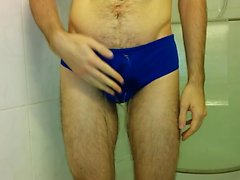 Piss and hands-free cum in speedos that are orange