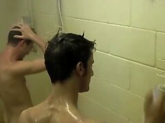 Athletic jocks wank their hard dicks in warm shower