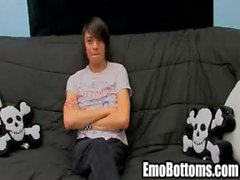 This sexy brunette emo twink is jerking his cock off