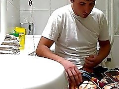Handsome gay dude caught jerking off in the toilet