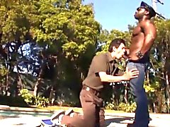 Sucking a big black dick in the poolside