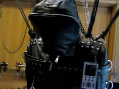 Estim in leather bondage